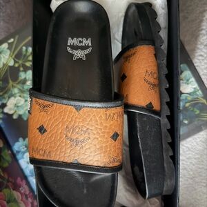MCM Black and Tan women Slides